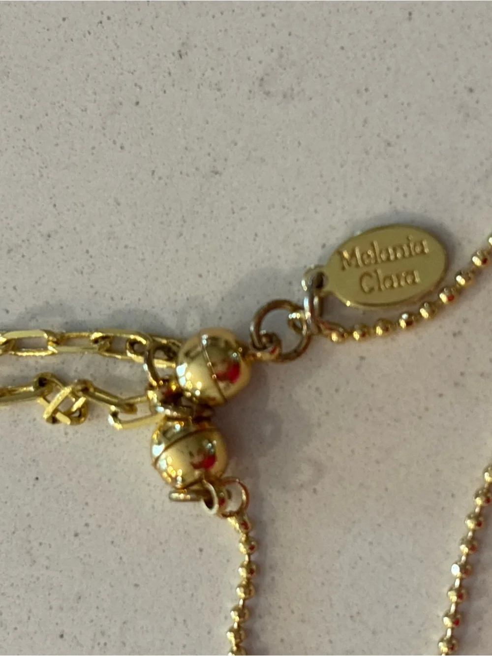 Melania Clara delicate gold